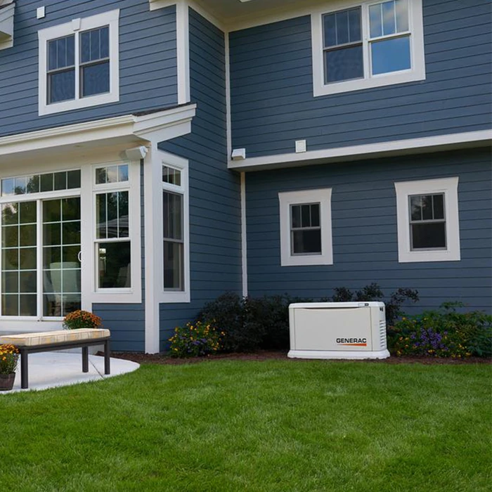 Generac generator next to a home